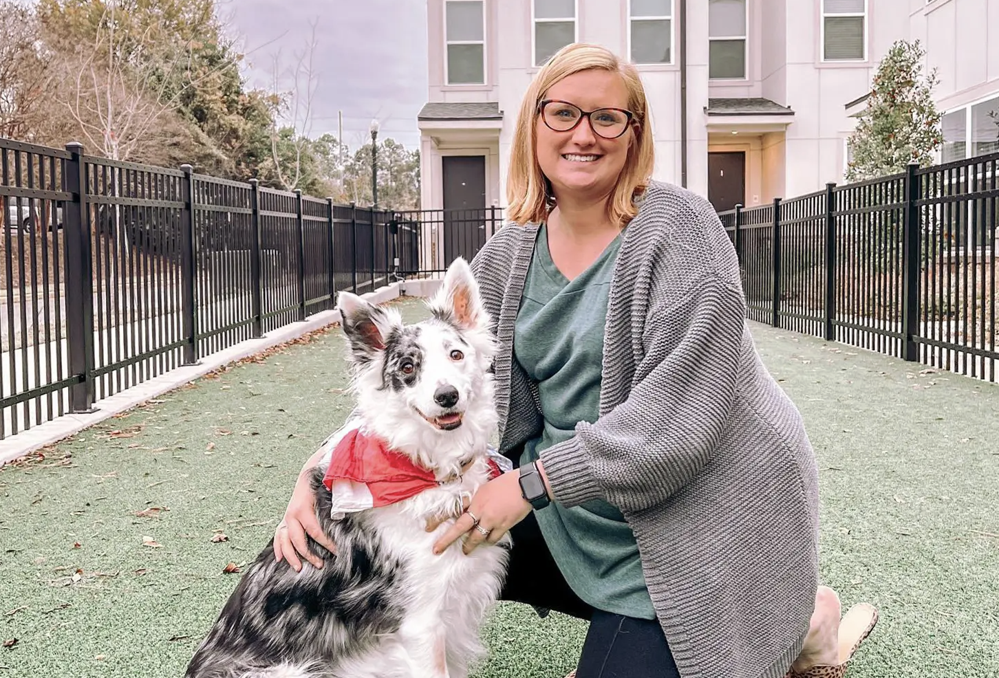 Person with dog in dog park