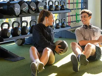 two young adults working out